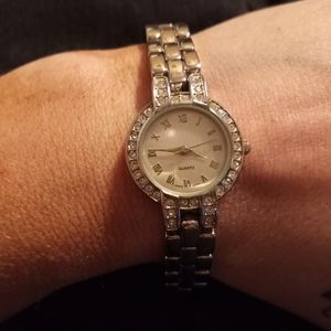 Silver time piece